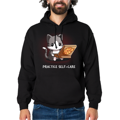 Pullover Hoodie_TeeTurtle black Practice Self-Care Pullover Hoodie featuring a happy gray-and-white cat holding an open pizza box with a pepperoni pizza and the text "Practice Self-Care."