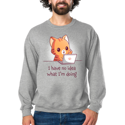Crew Neck Sweatshirt_TeeTurtle light gray I Have No Idea What I'm Doing (Cat) Crew Neck Sweatshirt featuring a cheerful orange tabby cat sitting behind a laptop with one paw raised and the text "I have no idea what I'm doing."