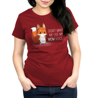 A woman wearing a TeeTurtle original red t-shirt with the product "Don't Make Me Use My Mom Voice" by TeeTurtle.