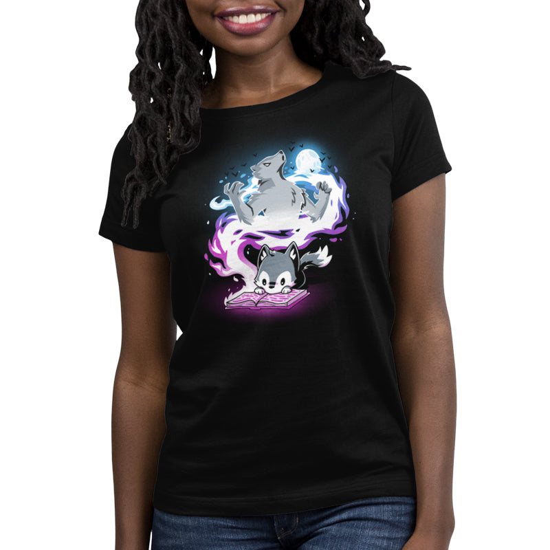 A TeeTurtle Moonlight Tale black t-shirt with an image of a cat, perfect for escaping into imagination.