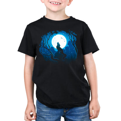 A young boy wearing a TeeTurtle Moonlight Wolf black t-shirt.