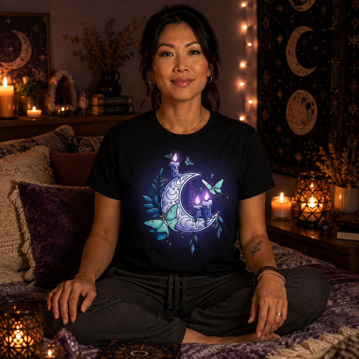 Premium Cotton T-shirt_TeeTurtle black Moonlit Luna Premium Cotton T-shirt featuring a glowing purple crescent moon adorned with candles, a luna moth, and delicate fern leaves in a mystical nighttime design.