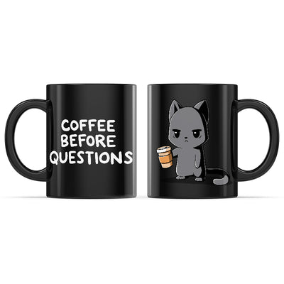 Ceramic Mug_TeeTurtle Coffee Before Questions black mug featuring a grumpy cat holding a cup of coffee.