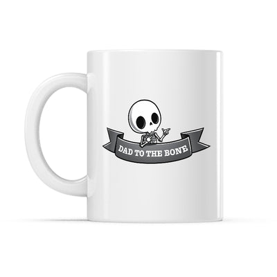 Ceramic Mug_TeeTurtle Dad to the Bone white mug featuring a skeleton making finger guns.