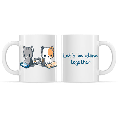 Ceramic Mug_TeeTurtle Let's Be Alone Together white mug featuring a cat playing video games, and a cat reading a book with their tails forming a heart between them.