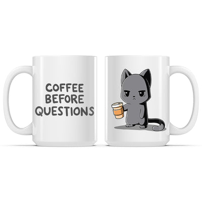 Ceramic Mug_TeeTurtle Coffee Before Questions white mug featuring a grumpy cat holding a cup of coffee.