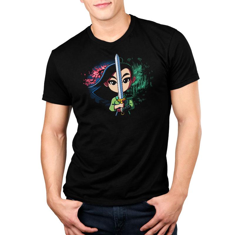 A man wearing a black Disney T-shirt with an image of a girl wielding a Double-Edged Sword.