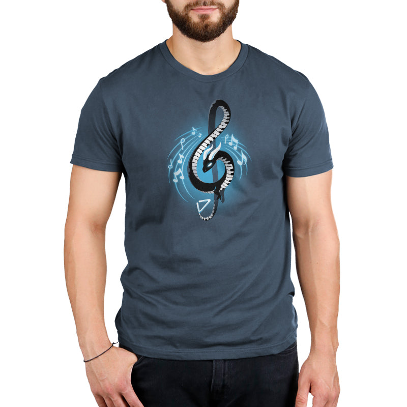 A man wearing a blue TeeTurtle Musical Dragon t-shirt with a treble clef.
