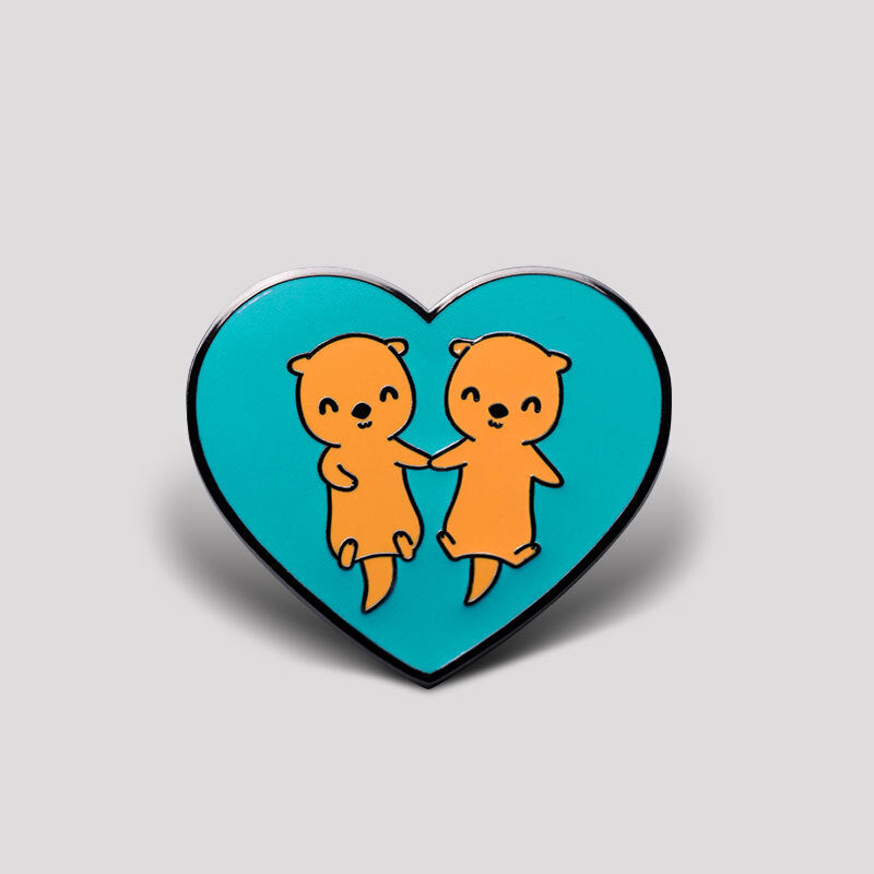Cute otters embracing in the TeeTurtle My Otter Half Pin.