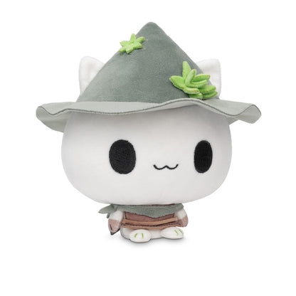 Cloudheads: 5" Mystic Moon (Fern). A cute white plush cat with large black eyes, a small wavy smile, wearing a gray pointed hat with green leaf accents and a brown skirt, photographed on a clean white background.