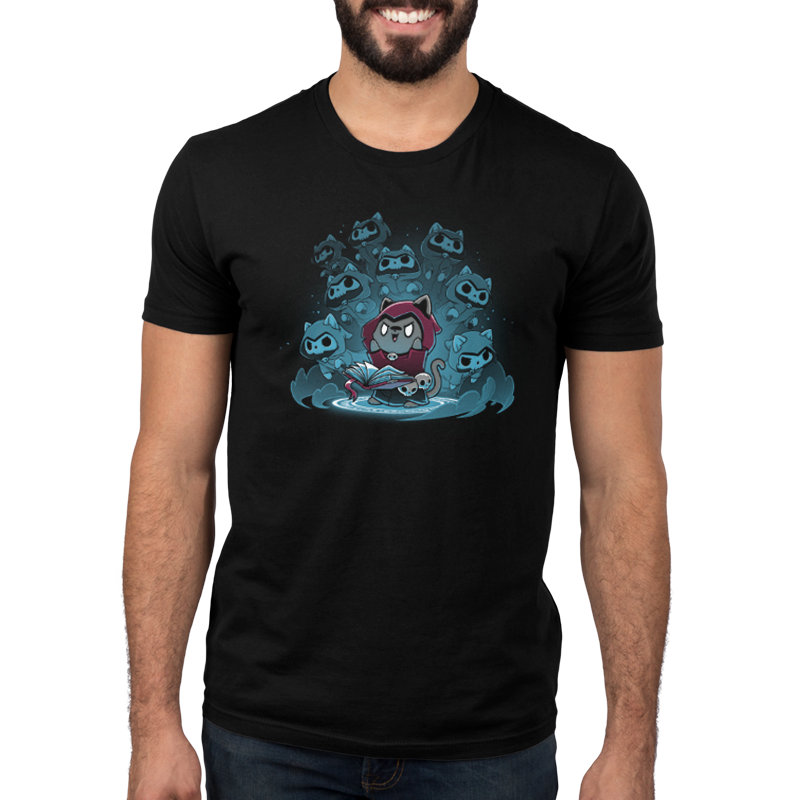 A man wearing a black t-shirt with an image of the "Necromancer Kitty" by TeeTurtle channels past lives.