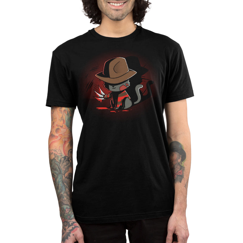 A spooky Nightmare Cat t-shirt with an image of a cowboy wearing a hat by TeeTurtle.