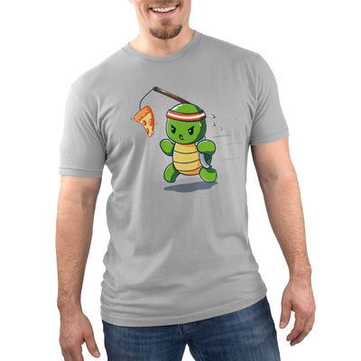 Premium Cotton T-shirt_TeeTurtle silver grey Ninja Training t-shirt featuring a turtle chasing after a pizza slice dangling from a stick strapped to their head.