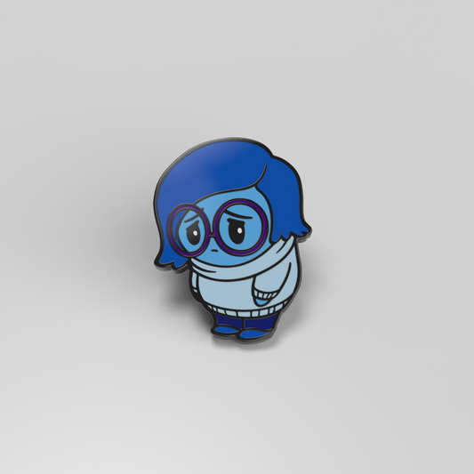 An officially licensed Sadness Pin from Pixar featuring Sadness from Inside Out wearing glasses.