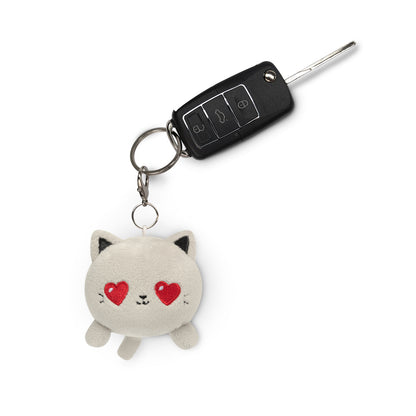 A TeeTurtle Cat Plushie Charm Keychain (Light Gray Love) with hearts on it.