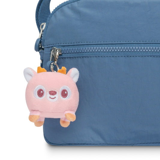 A portable TeeTurtle blue bag with a small TeeTurtle Deer Plushie Charm Keychain attached to it.