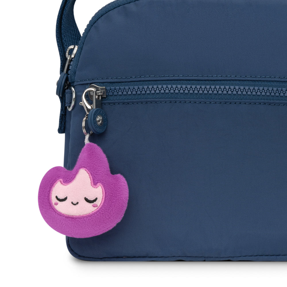 A portable bag with a TeeTurtle Flame Plushie Charm Keychain.