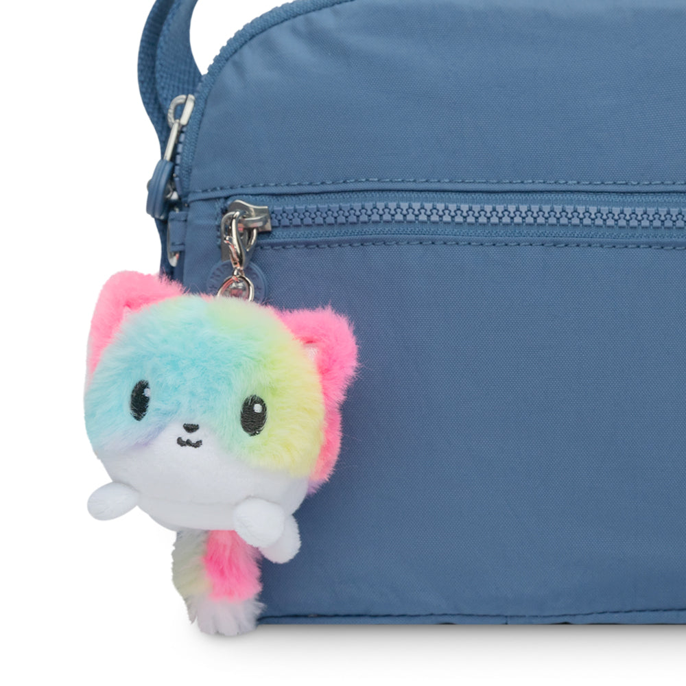 A portable blue purse with a TeeTurtle Fox Plushie Charm Keychain hanging from it.