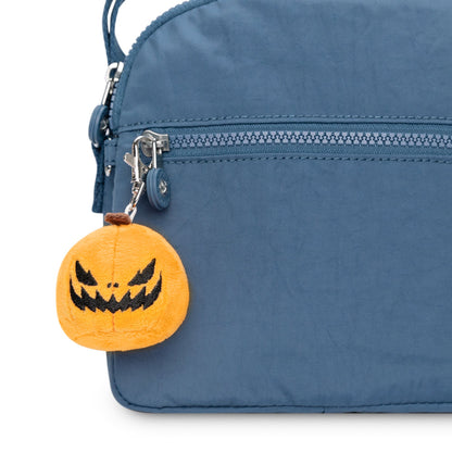 A TeeTurtle Jack-o-Lantern Plushie Charm Keychain with a jack o lantern on it.