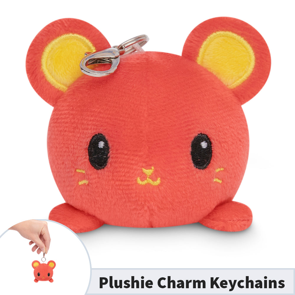 Celebrate Lunar New Year with our adorable TeeTurtle Lunar New Year Rat Plushie Charm Keychains! This limited edition red mouse is the perfect companion for the festivities. Its vibrant red color symbolizes good luck and prosperity.
