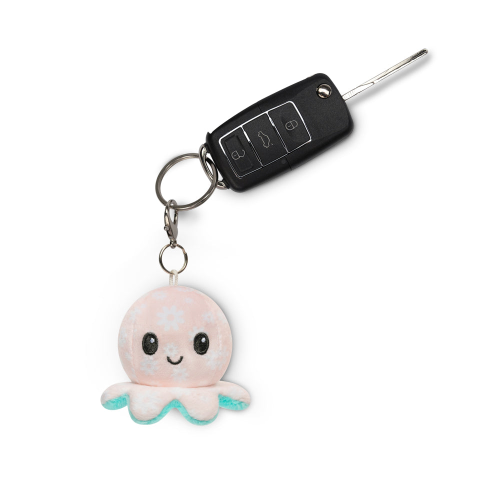 A TeeTurtle Octopus Plushie Charm Keychain with a pink octopus plushie on it.