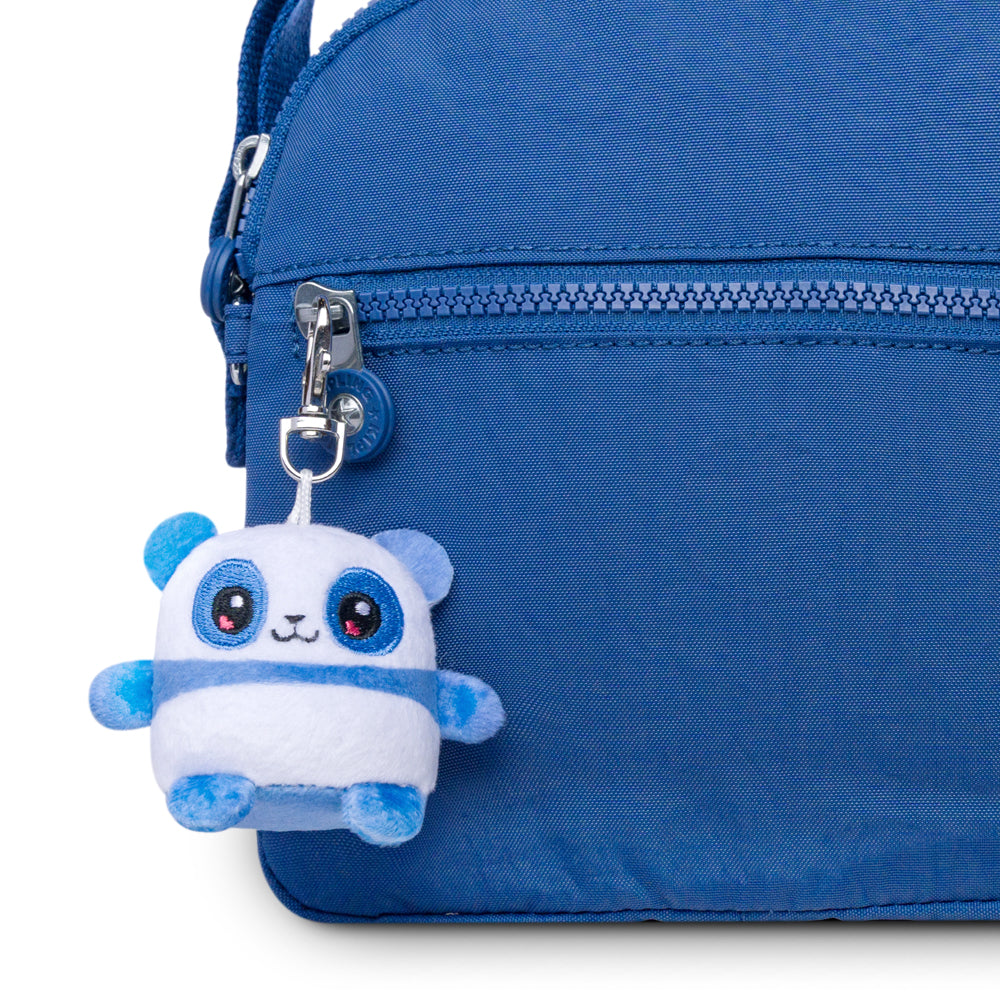 A blue backpack with a TeeTurtle Panda Plushie Charm Keychain attached to it.