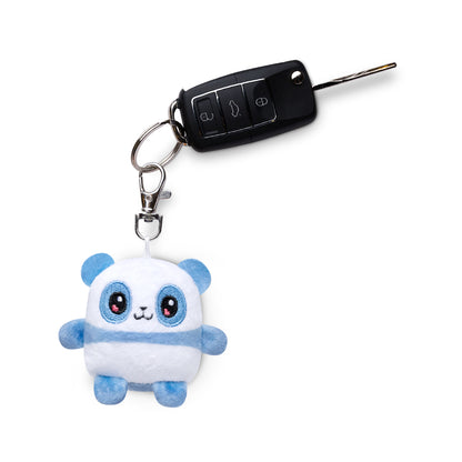 A TeeTurtle Panda Plushie Charm Keychain is attached to a car key.