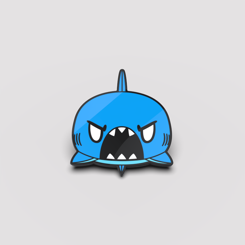 A TeeTurtle Angry Blue Shark Pin.