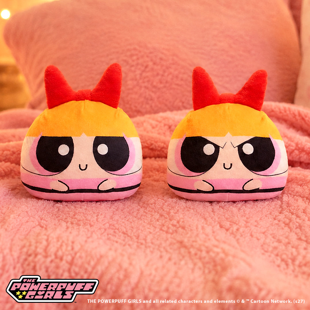 Blossom 4-inch reversible plush with red bow, orange hair, pink outfit, and a calm smiling expression.