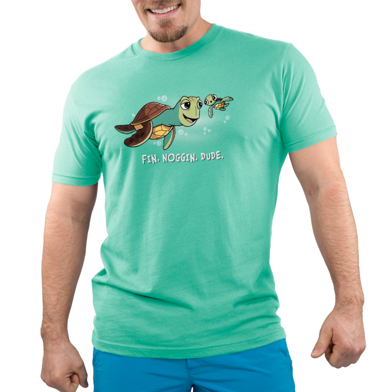 A man wearing an officially licensed Pixar Fin. Noggin. Dude t-shirt.