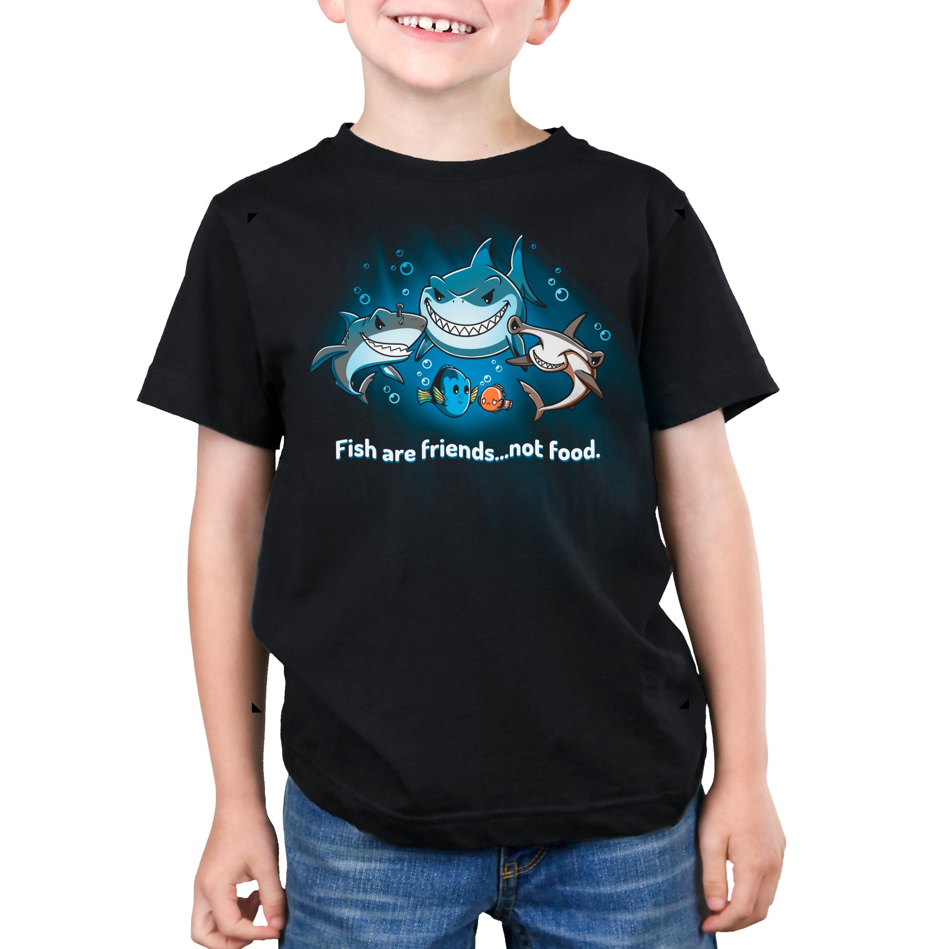 A young boy wearing a licensed Pixar Fish Are Friends...Not Food t-shirt.