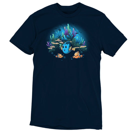 A Pixar Finding Nemo T-shirt featuring an image of Marlin, Nemo and Dory in the ocean.