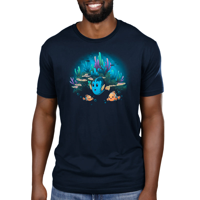 A licensed Pixar men's t-shirt with an image of Marlin, Nemo, and Dory in the ocean.