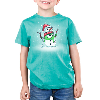 A young boy wearing a green t-shirt with Pixar's Snowman Mike on it.