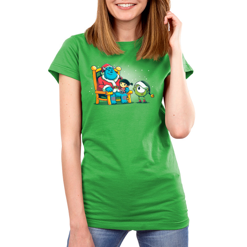 A women's Disney green t-shirt featuring an image of Santa Sully, Elf Mike, and Boo.
