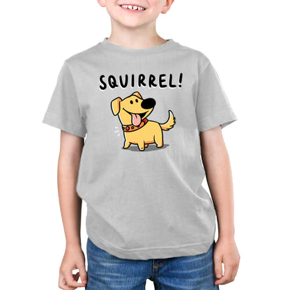 A young boy wearing a Disney kids T-shirt that says Squirrel!.