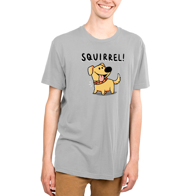 A young man wearing an officially licensed Disney t-shirt that says Squirrel! inspired by Dug from Up.