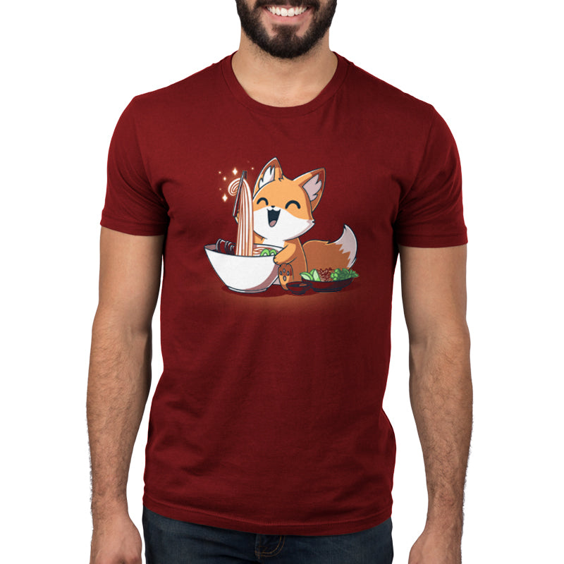 A man wearing a red Pho Fox t-shirt with a TeeTurtle fox.