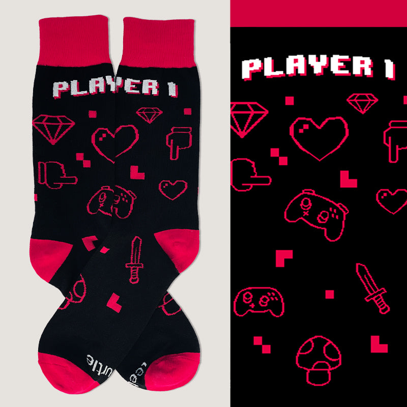 Comfortable Player 1 socks with the words player 1 on them, by TeeTurtle.