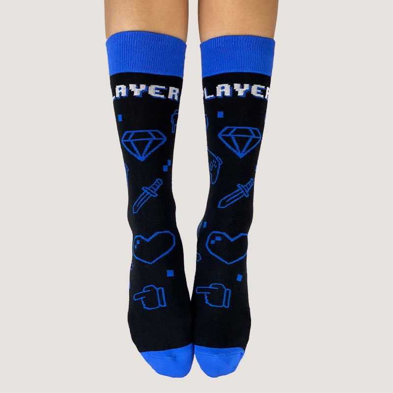 One Size Fits All Player 2 Socks with a gaming-inspired 'layer' design, providing both comfort and fit by TeeTurtle.