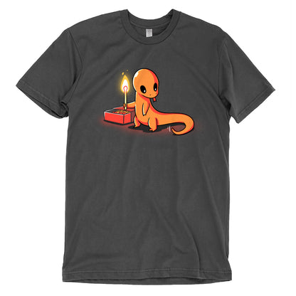 A charcoal gray t-shirt featuring an orange lizard holding a candle, Playing With Fire, by TeeTurtle.