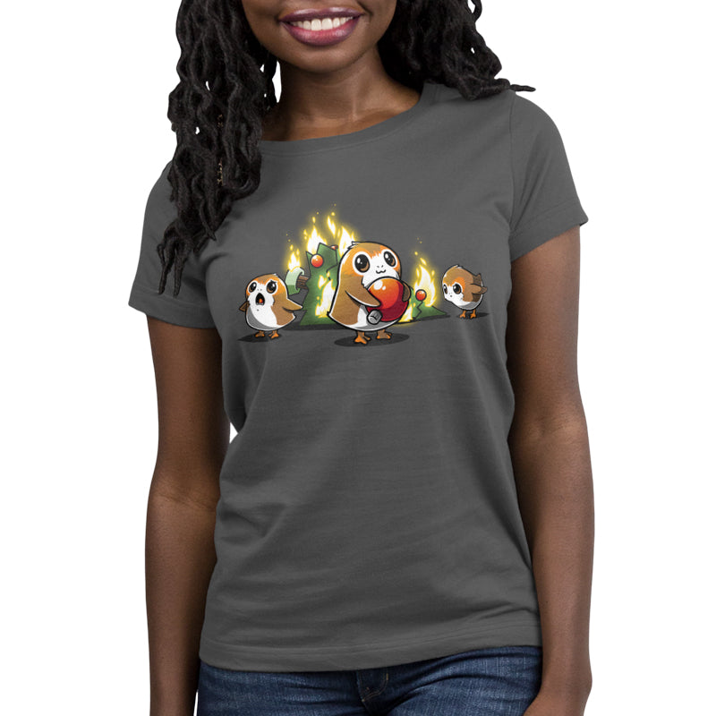 A woman wearing a gray Star Wars t-shirt with the product name "A Porg Christmas" and brand name "Star Wars".