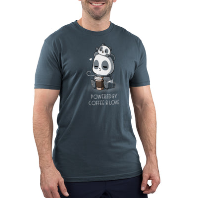 Premium Cotton T-shirt_Teeturtle denim blue Powered by Coffee & Love apparel  featuring a sleepy panda holding a coffee cup with a smaller panda on its head. Text below reads, "Powered by Coffee & Love." 