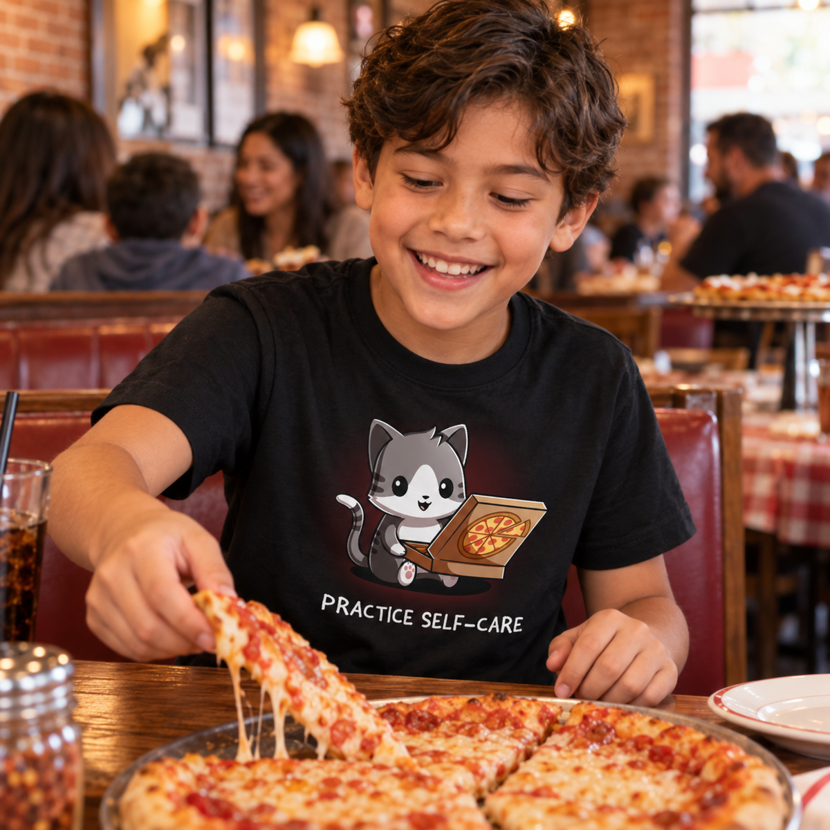 Kids' Classic T-Shirt_TeeTurtle black Practice Self-Care Kids' Classic T-Shirt featuring a happy gray-and-white cat holding an open pizza box with a pepperoni pizza and the text "Practice Self-Care."