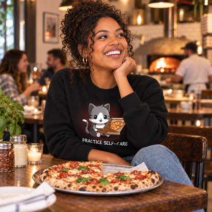 Crew Neck Sweatshirt_TeeTurtle black Practice Self-Care Crew Neck Sweatshirt featuring a happy gray-and-white cat holding an open pizza box with a pepperoni pizza and the text "Practice Self-Care."