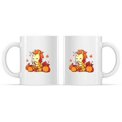 Ceramic Mug_TeeTurtle Pumpkin Spice Unicorn white mug featuring a smiling unicorn enjoying a warm pumpkin spice drink while sitting among pumpkins and colorful autumn leaves with leaves drifting through the air.