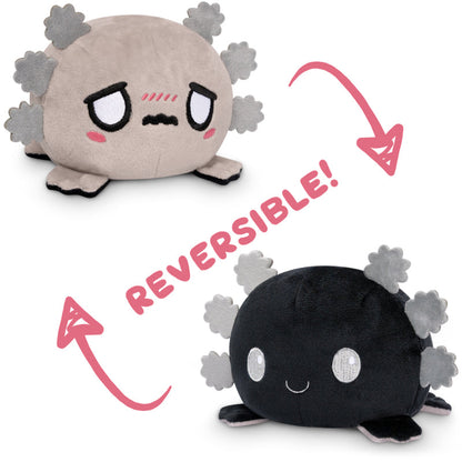 A TeeTurtle Reversible Axolotl Plushie (Gray + Black) by TeeTurtle.