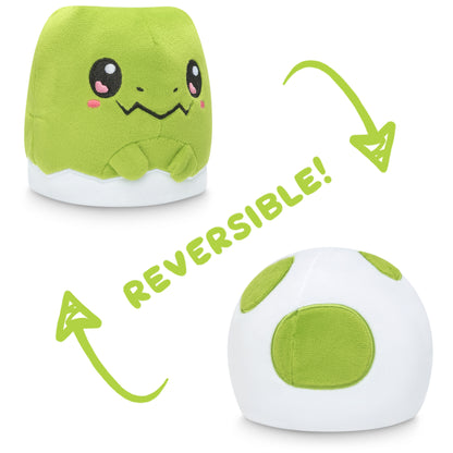 A TeeTurtle Reversible T-Rex & Dinosaur Egg plushie, with the words reversible.