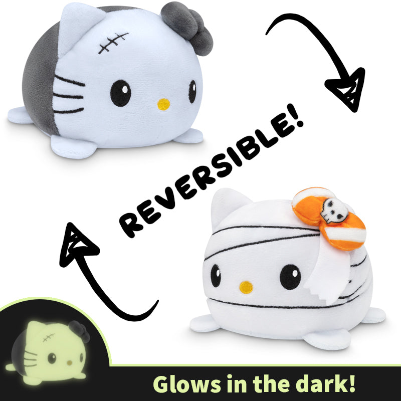 The Sanrio TeeTurtle Reversible Hello Kitty Plushie (Monster Glow + Mummy) glows in the dark, perfect for adding a touch of cuteness to your darkened room.