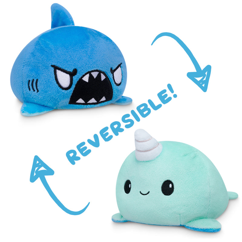 Two TeeTurtle Reversible Shark & Narwhal Plushies (Blue + Aqua) that are reversible.